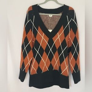 Womens medium orange and black sweater